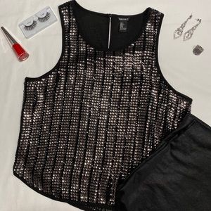 Black sequin blouse.